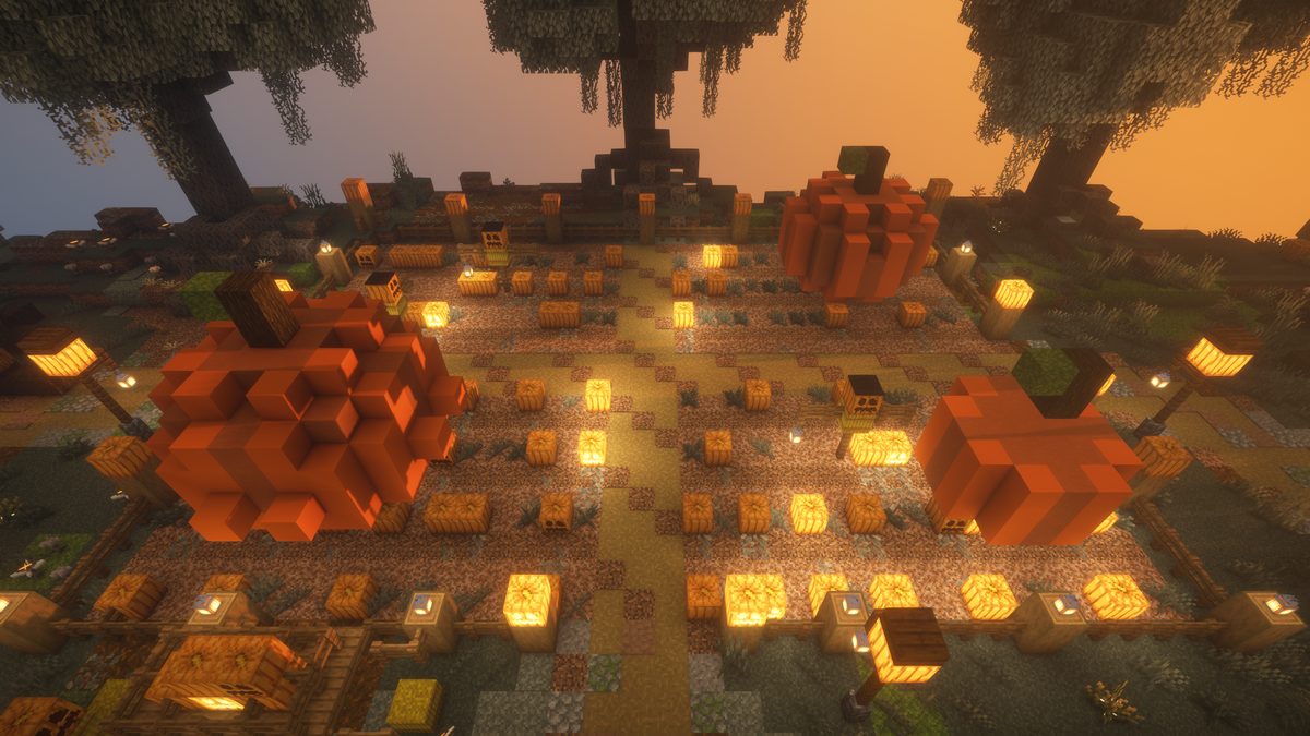 A pumpkin patch plaza lit by jack o'lanterns at dusk