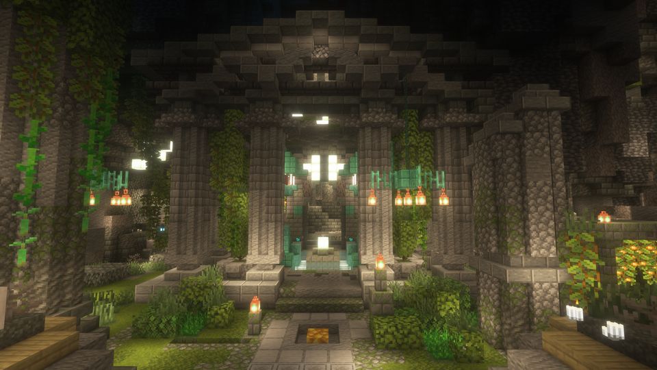 A temple front covered in vines, lit by lanterns